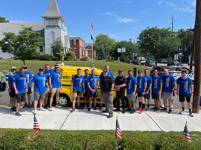 Twin Boro Pest Control team hands out water at New Jersey Special Olympics Torch Run