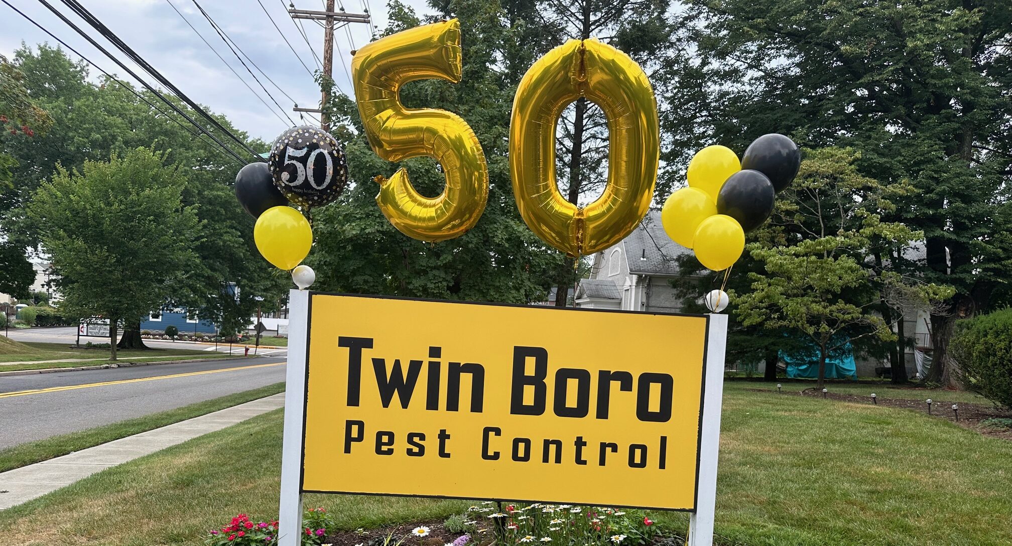 Twin Boro Banner with the balloon of 50 years anniversary